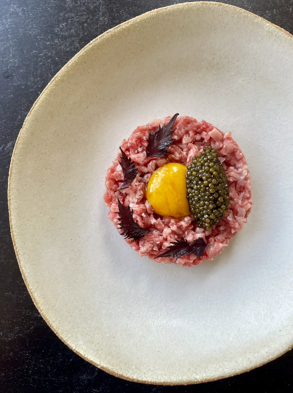 wagyu tartare with soy cured egg and caviar